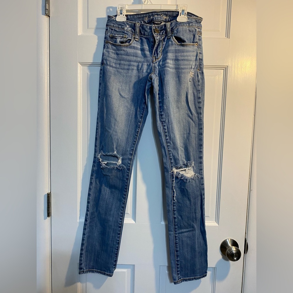 American Eagle skinny ripped jeans.